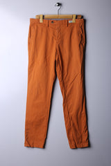 Vintage 90's Tommy Hilfiger Pants/Jeans Orange - (W32,L34)